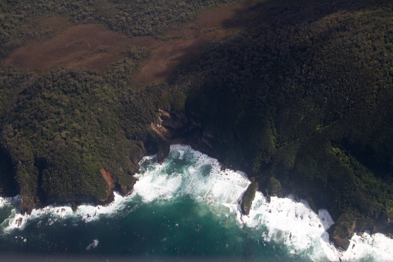 Waves Breaking On Headland