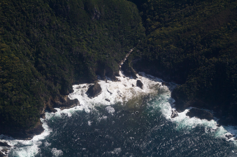 Waves Breaking On Headland