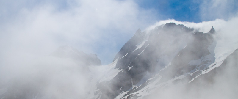 Peaks In Clouds