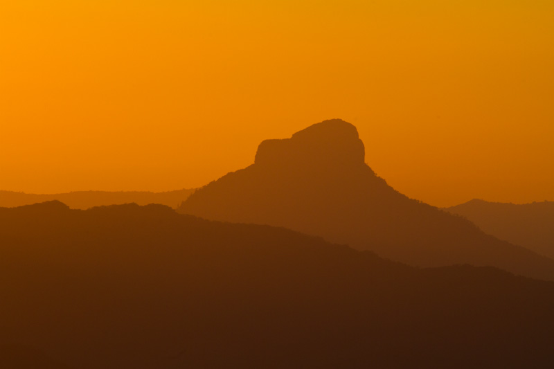 Forested Ridges At Sunset