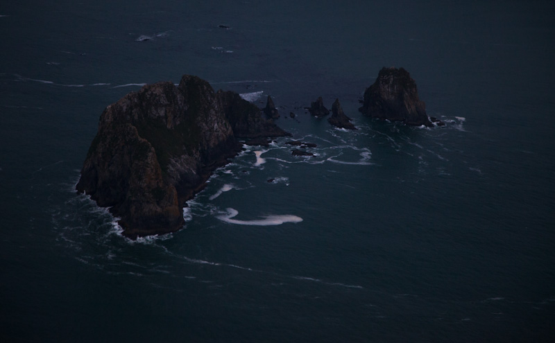 Waves Breaking Over Rocks