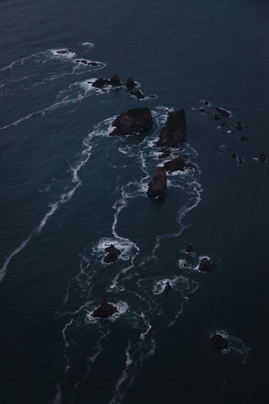 Waves Breaking Over Rocks