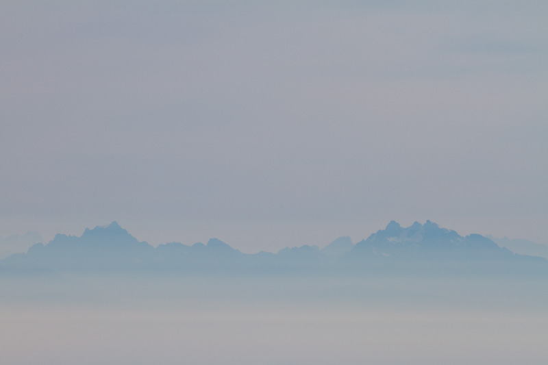The Cascade Range In Clouds