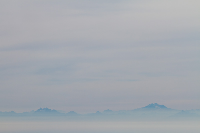 The Cascade Range In Clouds