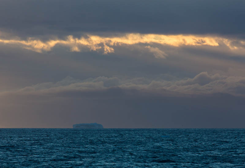 Iceberg And Clouds