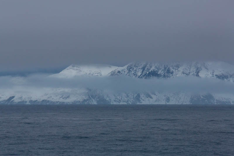 Peaks Through Clouds