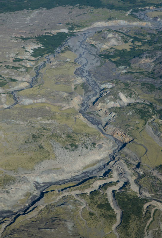 Stream Cutting Through Volcanic Badlands