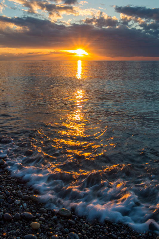 Sunset And Waves