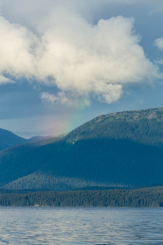 Rainbow And Clouds