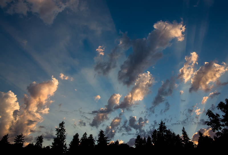 Sun Beams Through Clouds